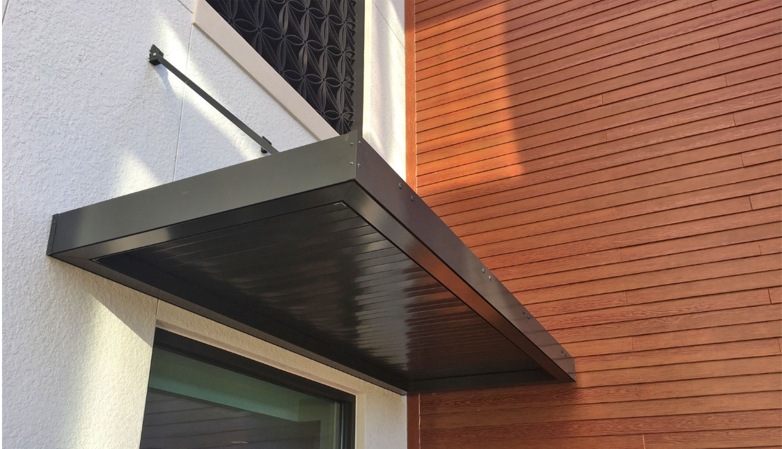 Architectural metal awning (door)